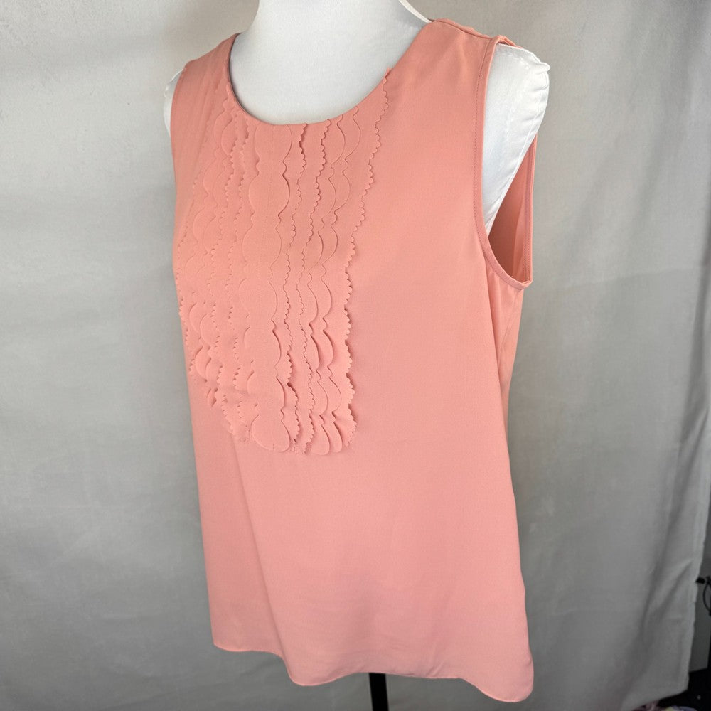 Side view of Banana republic Pink sleeveless top with scallop details on a mannequin against a gray background
