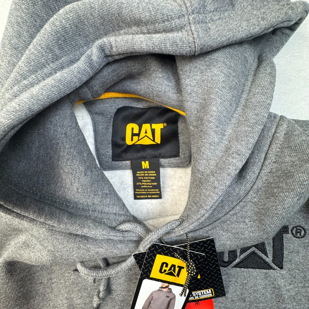 Clothing tag view of CAT gray hoodie with a visible logo size m