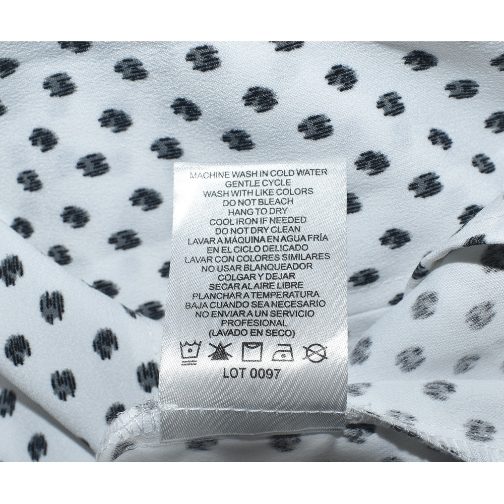 Clothing care tag view on Hilary Radley blouse white with black polka dots