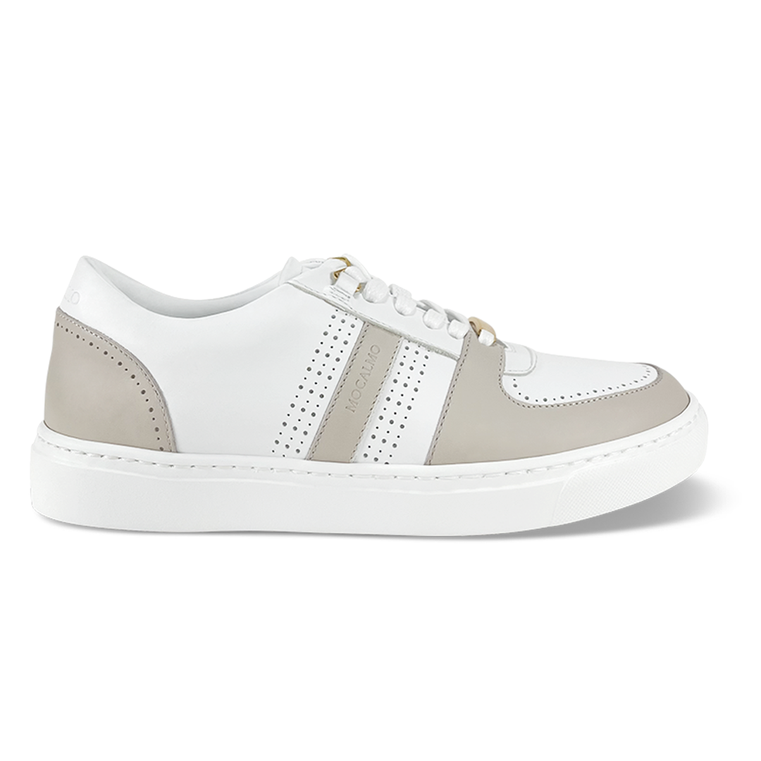 Side view of MOCALMO Norma women's white leather sneakers with ivory-gray accents, perforated side panels, white laces and white rubber soles.