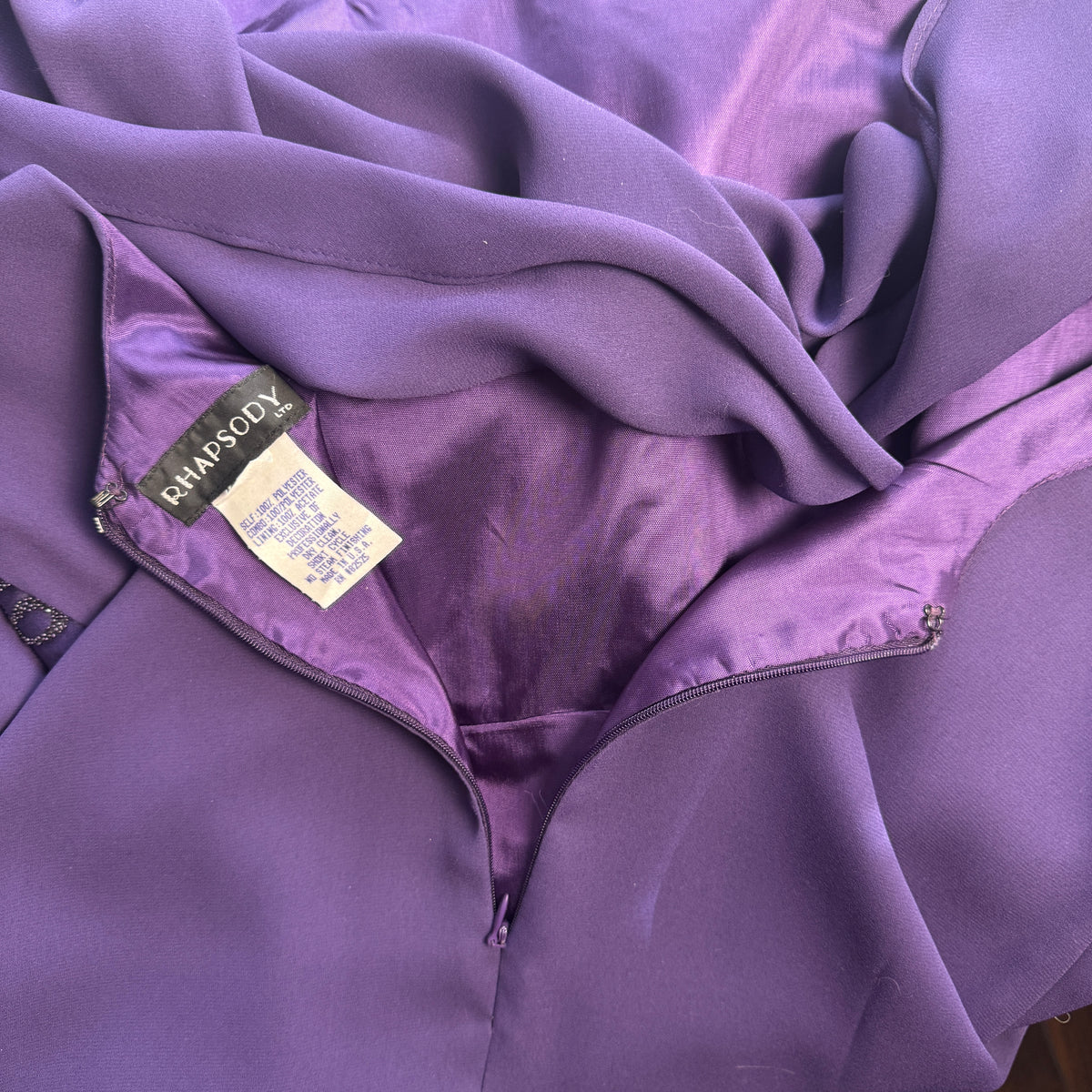 Rhapsody purple formal gown label closure