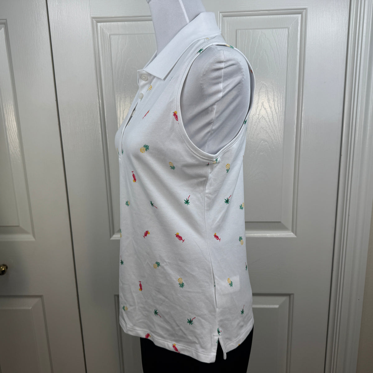Tommy Bahama NWT Women's Everyday Active Tropical Print Sleeveless Polo White Size MNWT Tommy Bahama Women's Everyday Active Tropical Print Sleeveless Polo White Size M