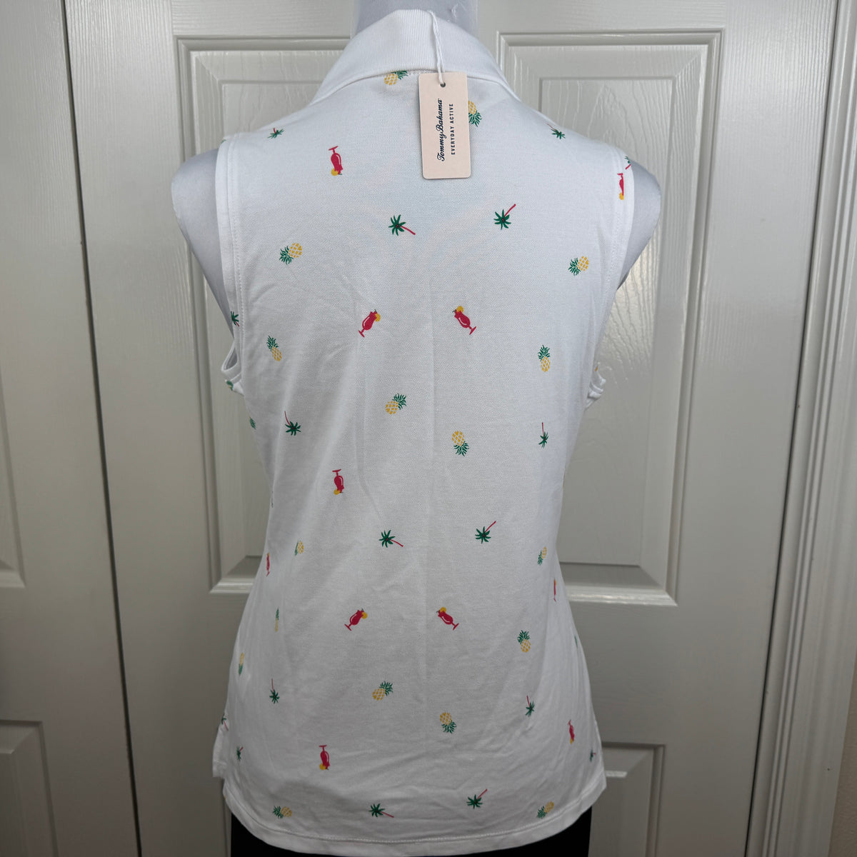Tommy Bahama NWT Women's Everyday Active Tropical Print Sleeveless Polo White Size MNWT Tommy Bahama Women's Everyday Active Tropical Print Sleeveless Polo White Size M