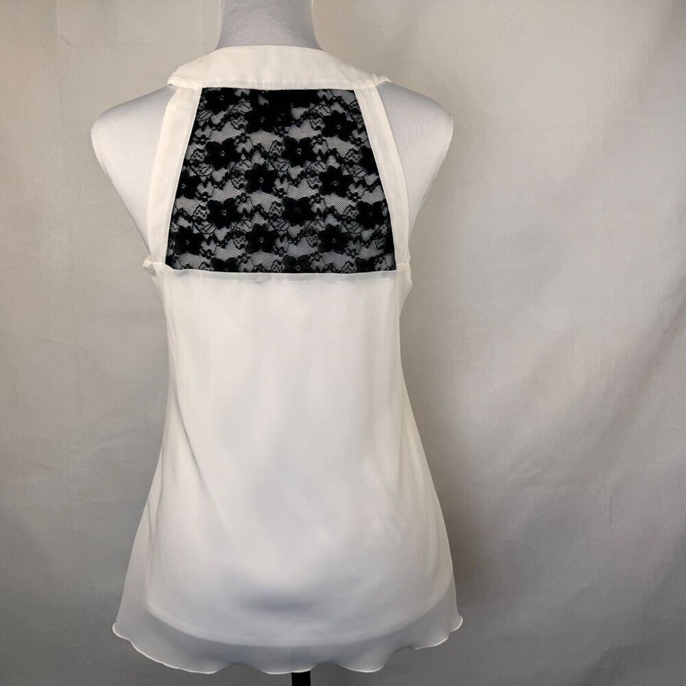BCX Ladies Blouse Sz M White VNeck Ruffles Sleeveless Black Lace Back