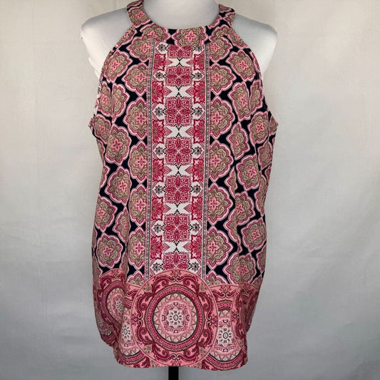 A sleeveless halter top with a pink, red, and black geometric and floral mandala pattern, displayed on a white mannequin torso against a light gray fabric backdrop.