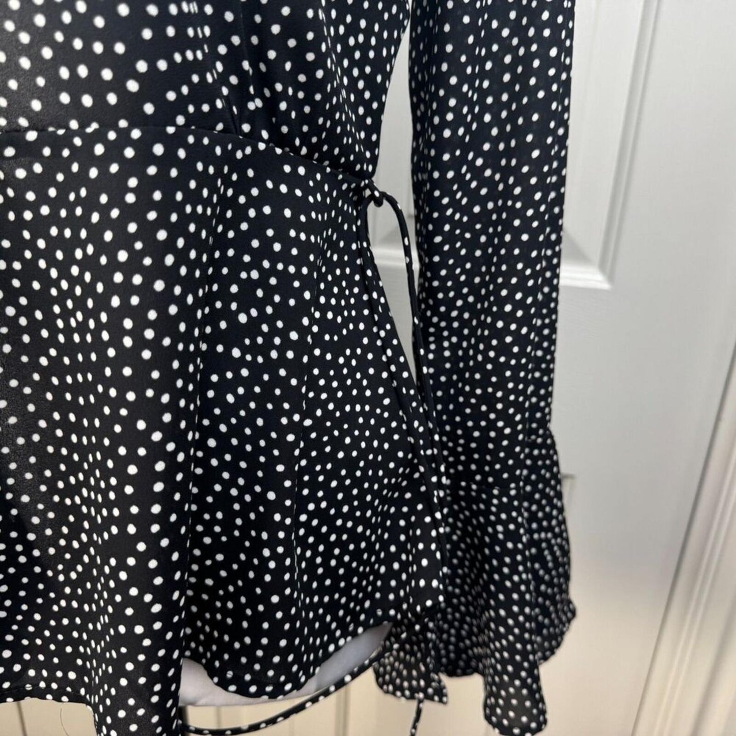 Lulus Women Blouse Sz XS Black White Polka Dot Peplum Wrap Flutter Long Sleeve