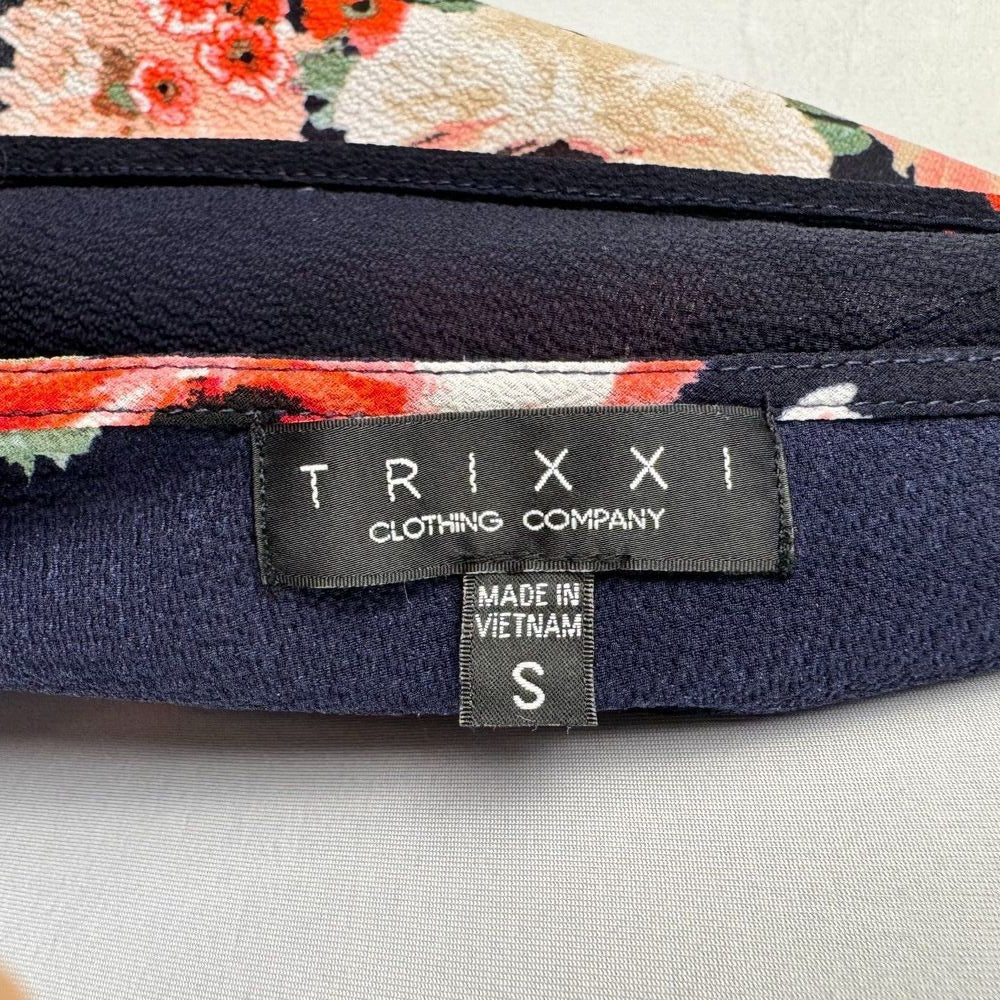 Trixxi Clothing Co Romper Sz S Black Navy Floral Ruffled Sleeve Surplice Wrap