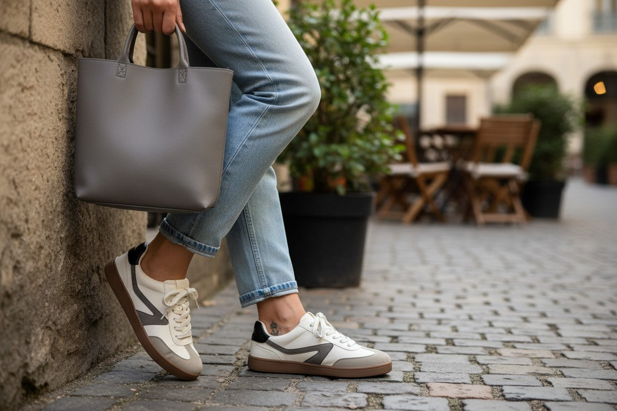 Dolce Vita Voyage mixed-media retro sneakers in ivory, beige, and charcoal, size 8.5 worn with jeans