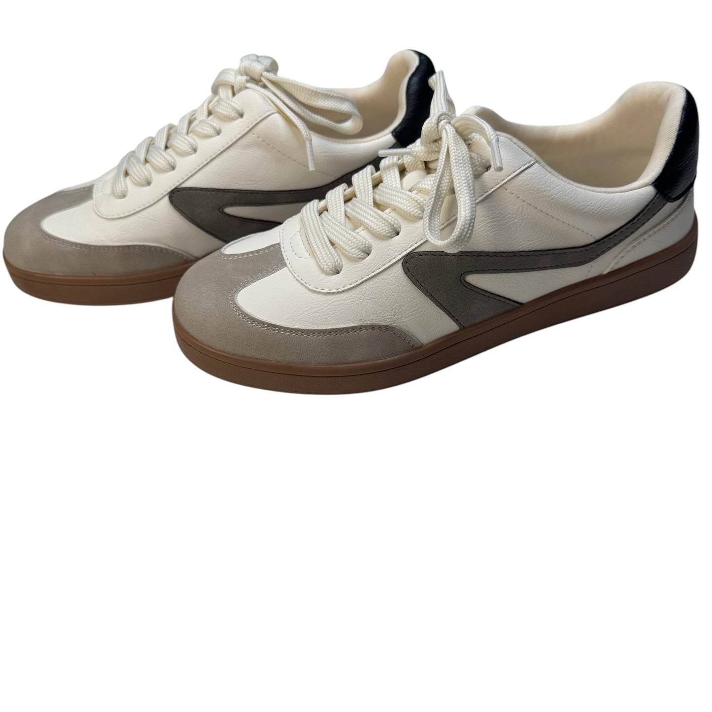 Side profile view of Dolce Vita Voyage ivory and beige suede retro sneakers