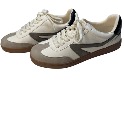 Side profile view of Dolce Vita Voyage ivory and beige suede retro sneakers