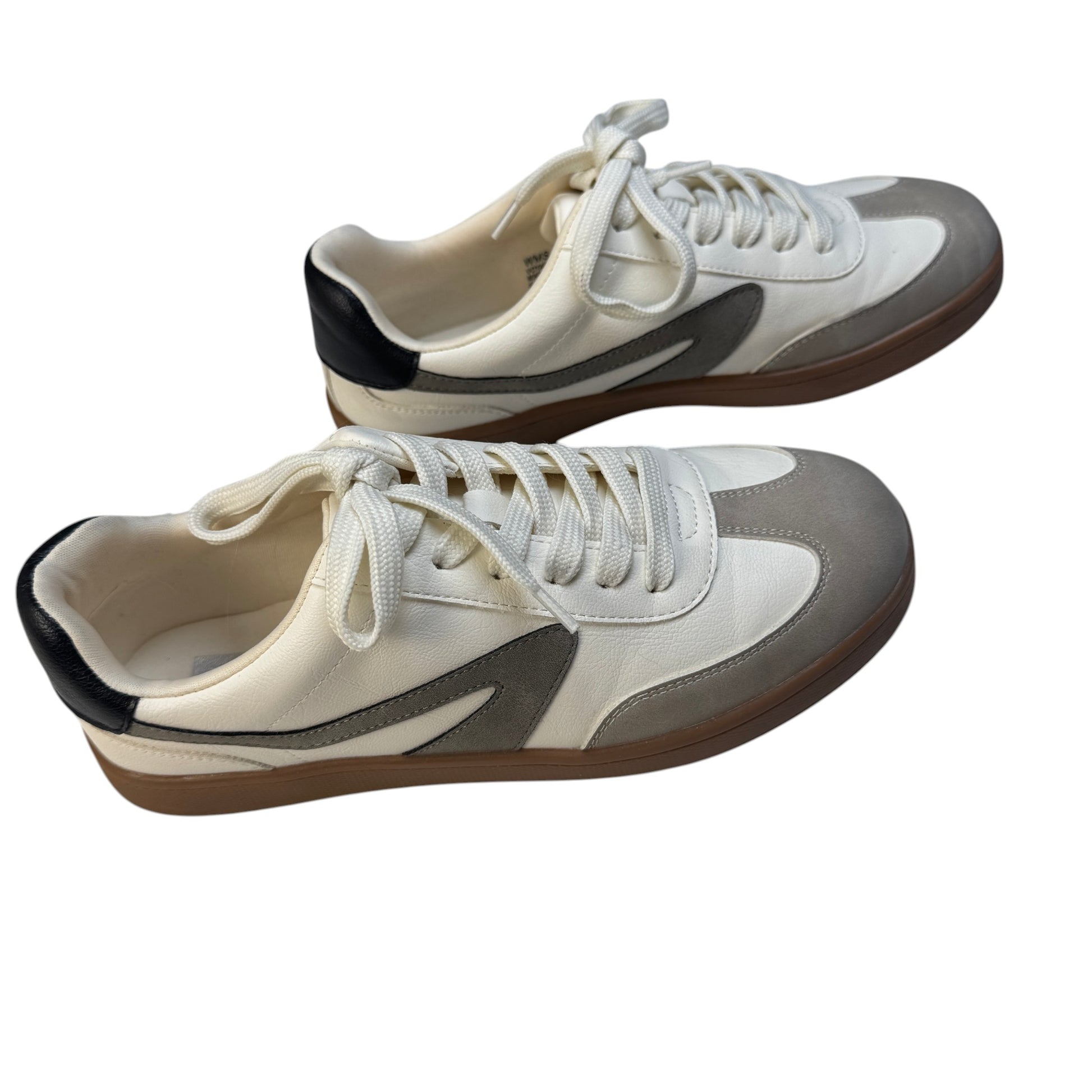 Side profile view of Dolce Vita Voyage ivory and beige suede retro sneakers