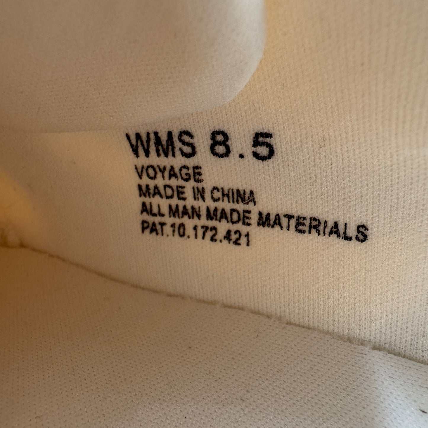 Insole and interior label view of Dolce Vita Voyage sneakers size 8.5.