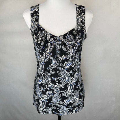 A sleeveless scoop-neck top with a black, white, and blue paisley pattern, displayed on a white mannequin torso against a light gray fabric backdrop.