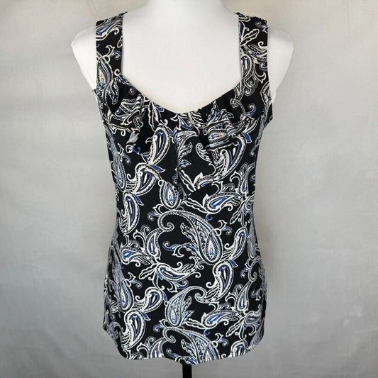 A sleeveless scoop-neck top with a black, white, and blue paisley pattern, displayed on a white mannequin torso against a light gray fabric backdrop.
