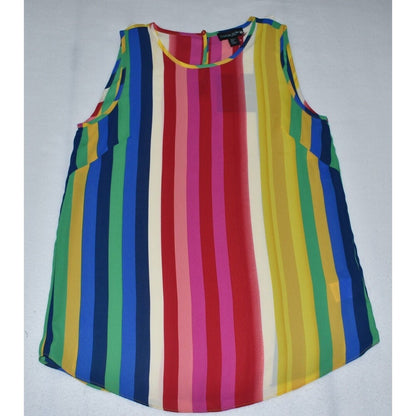A sleeveless top with vertical rainbow stripes in red, pink, orange, yellow, green, blue, and white, laid flat on a light gray background.