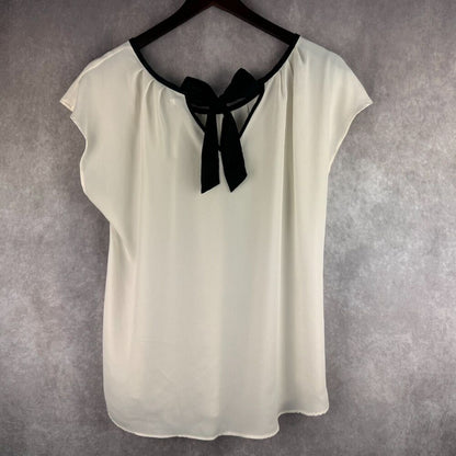 Lauren Conrad Blouse Sz L Bone/Cream with black edged neckline back knot closure