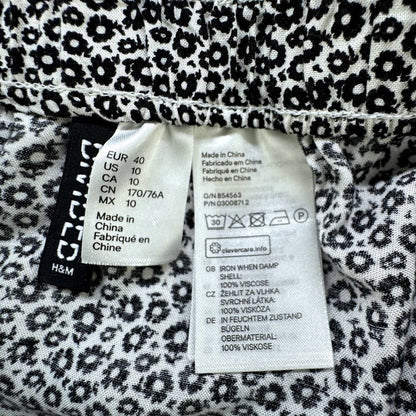 Divided H&M Floral circle skirt White with black flowers Size 10
