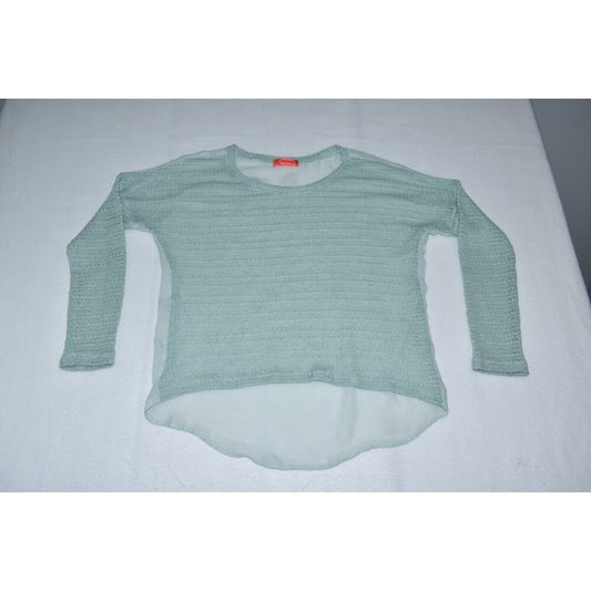A light sage green ribbed knit long-sleeve top with a high-low hem, laid flat on a white surface.