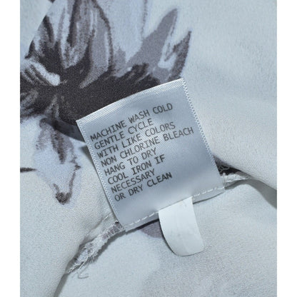 Anne Carson Woman's White top and brown flowers Sleeveless Size S