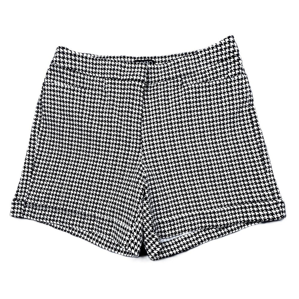 Black and white houndstooth patterned shorts, laid flat on a white background.