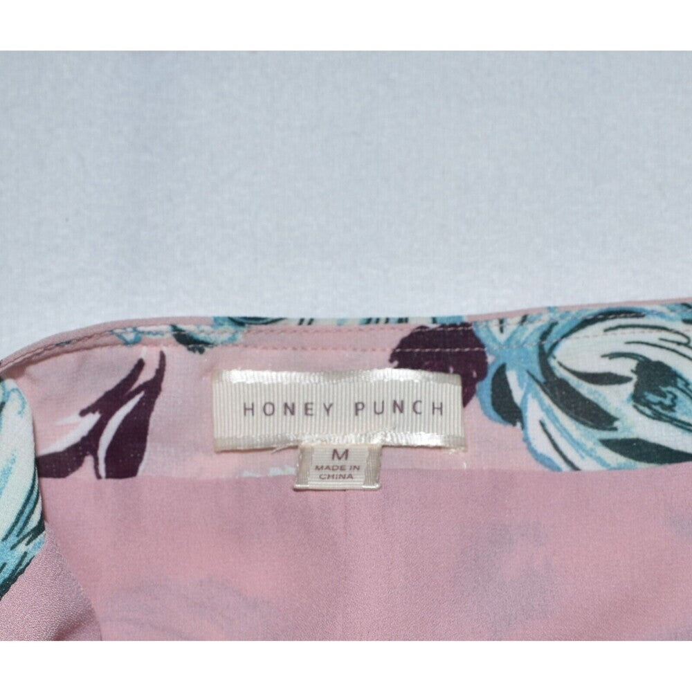 Falda midi Honey Punch talla M, estampado floral rosa, con forro