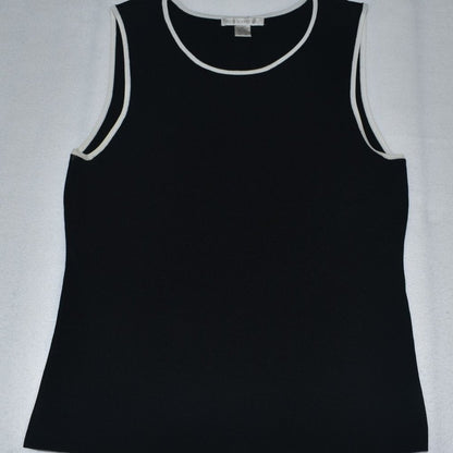 A black sleeveless tank top with white contrast trim around the scoop neck and armholes, laid flat on a light gray background.