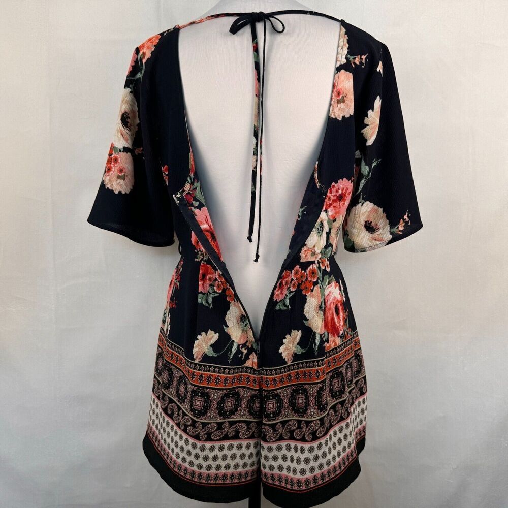 Trixxi Clothing Co Romper Sz S Black Navy Floral Ruffled Sleeve Surplice Wrap