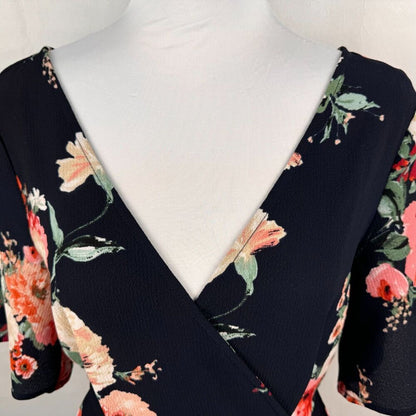 Trixxi Clothing Co Romper Sz S Black Navy Floral Ruffled Sleeve Surplice Wrap