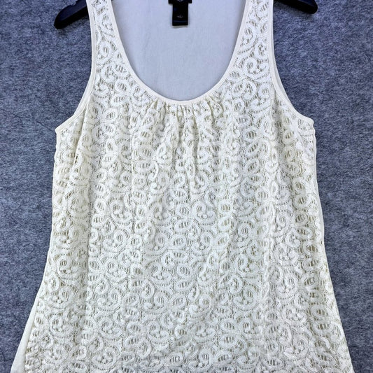 An off-white lace sleeveless top with a gathered neckline, hanging on a black hanger against a textured gray background.