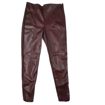 A pair of dark burgundy faux leather pants with a glossy finish, shown flat against a plain white background.