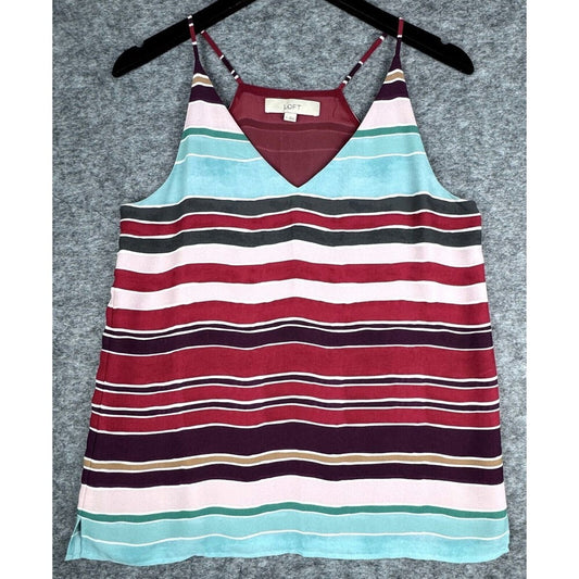 A striped camisole tank top with thin straps, hanging on a black hanger against a textured gray background. The top features horizontal stripes in red, light blue, white, dark gray, and deep purple.