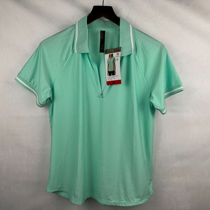A mint green short-sleeve polo shirt with white piping on the collar and sleeve cuffs, hanging on a black hanger against a light gray fabric backdrop. The shirt has a partial zip at the collar and still has its retail hangtag attached.