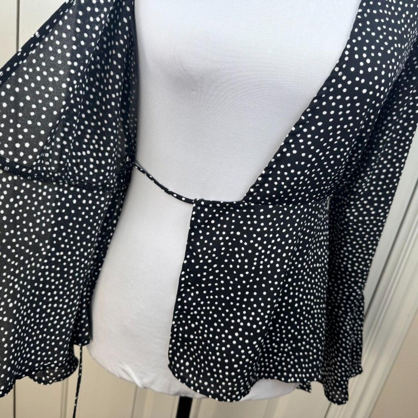 Lulus Women Blouse Sz XS Black White Polka Dot Peplum Wrap Flutter Long Sleeve
