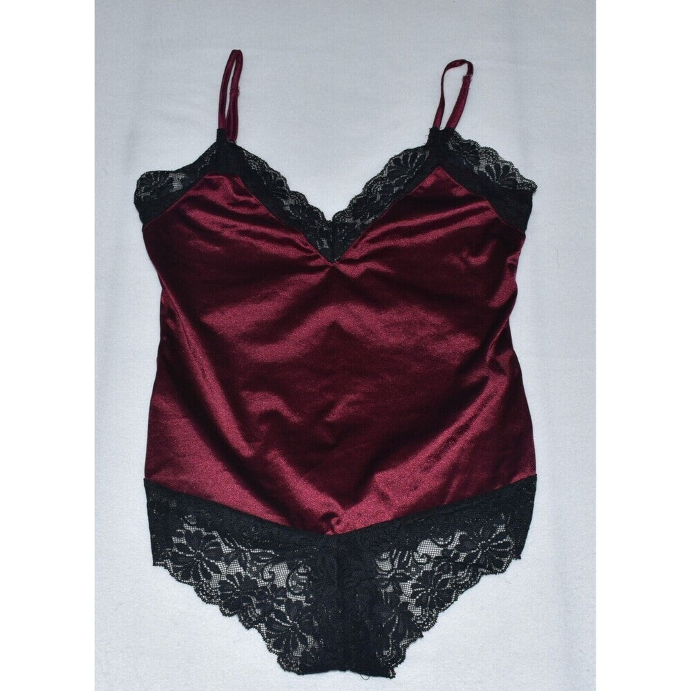 A burgundy satin lingerie bodysuit with black lace trim on the cups, underwire, and leg openings, displayed flat against a light gray background.
