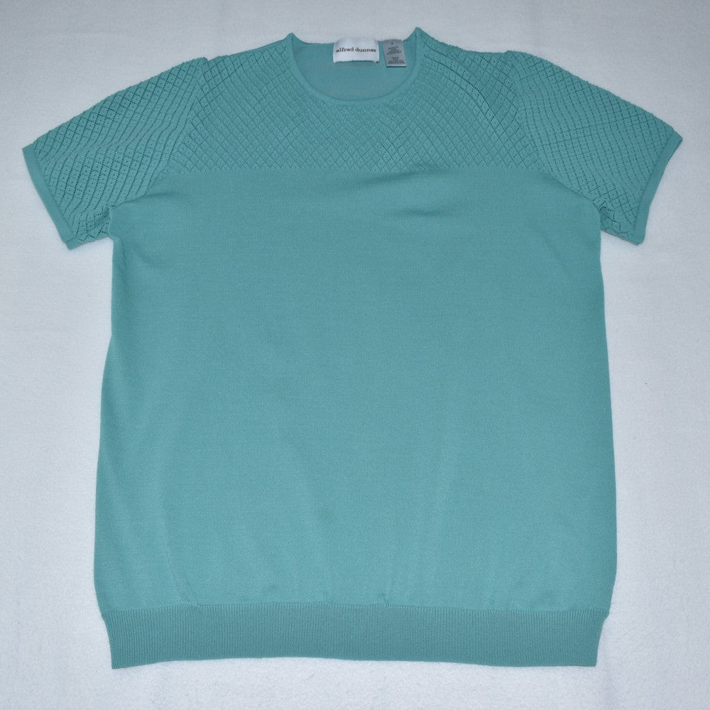 Front view on Alfred Dunner knit green top short sleeve on a white backgroumd