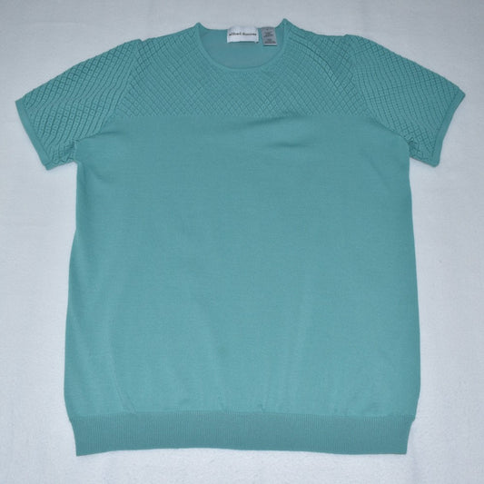 Front view on Alfred Dunner knit green top short sleeve on a white backgroumd