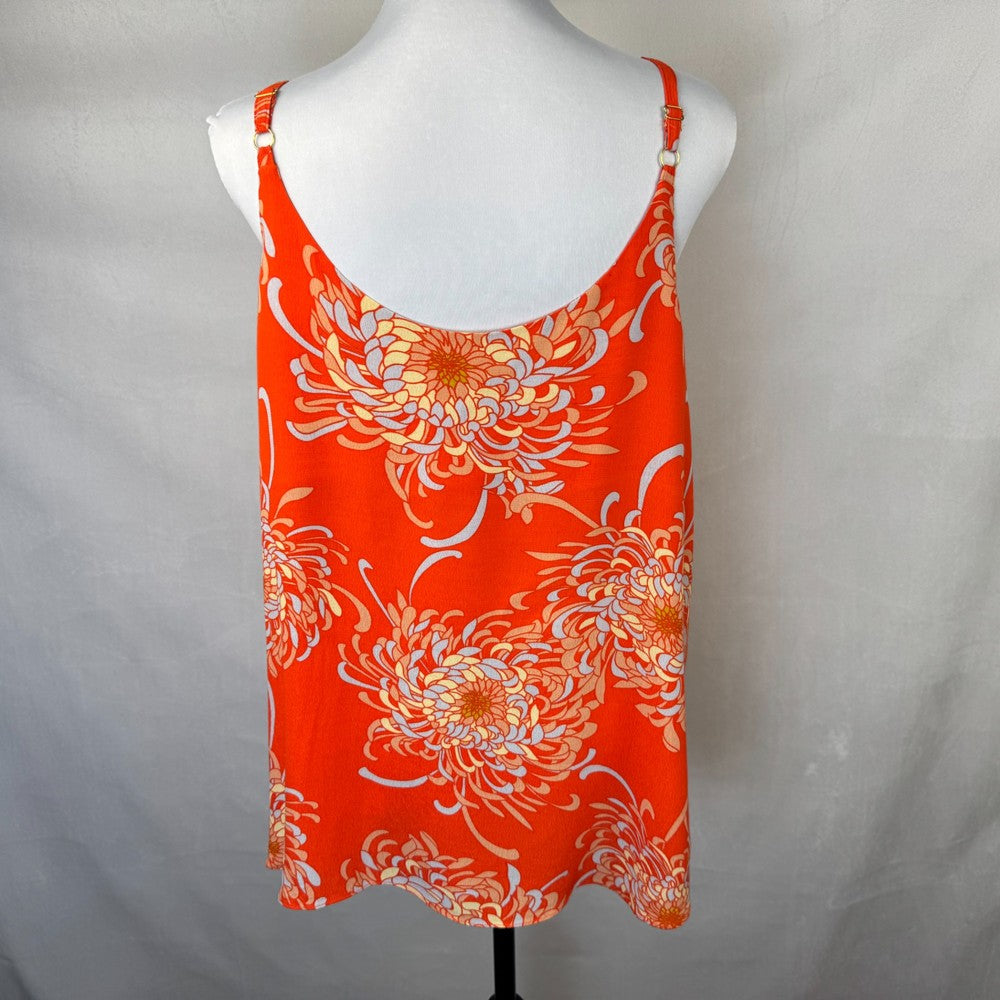 Back view of Cabi orange floral tank top on a mannequin against a plain background