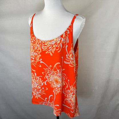 Side view of a Cabi orange floral top on a mannequin against a plain background