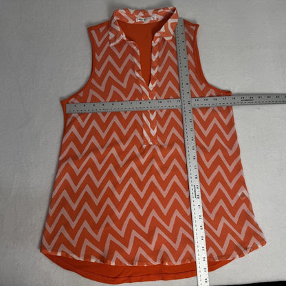 Measurements view on Femme by Tresics orange sleeveless top with white zigzag pattern and a ruler for size reference on a gray background