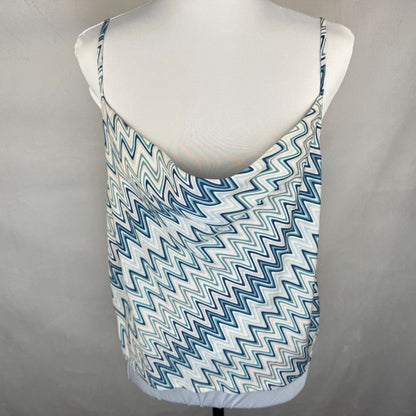 Front view of Forever 21 White tank top with blue zigzag pattern on a mannequin against a gray background