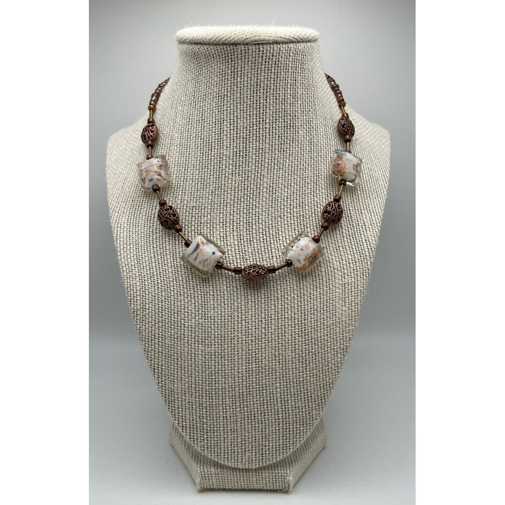 Main view of handmade necklace with brown and beige lampwork beads 