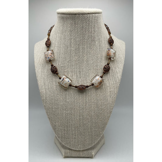 Main view of handmade necklace with brown and beige lampwork beads 