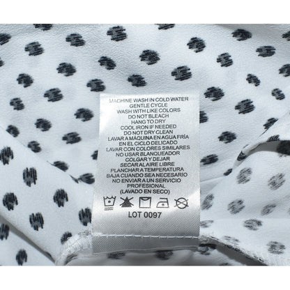 Clothing care tag view on Hilary Radley blouse white with black polka dots