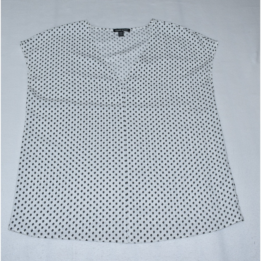 Front view of Hilary Radley white sleeveless top with black polka dot pattern on a light gray background
