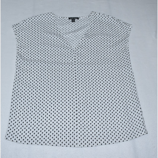 Front view of Hilary Radley white sleeveless top with black polka dot pattern on a light gray background