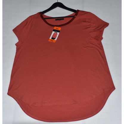 Front View on Joan Vass top in red with satin trim