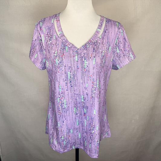Front view of purple Noracora top V Neck on a mannequin against a plain background