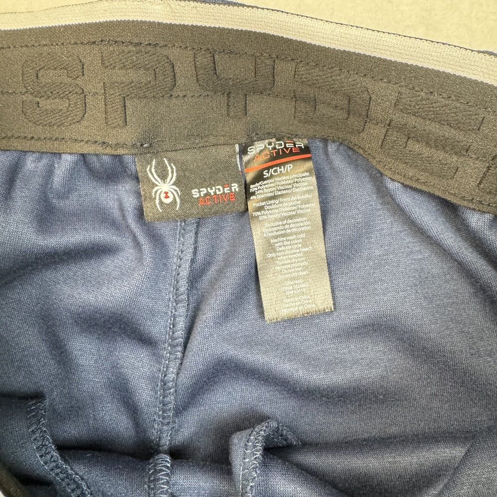 Clothing tag view on Spyder blue jogger pants, size S