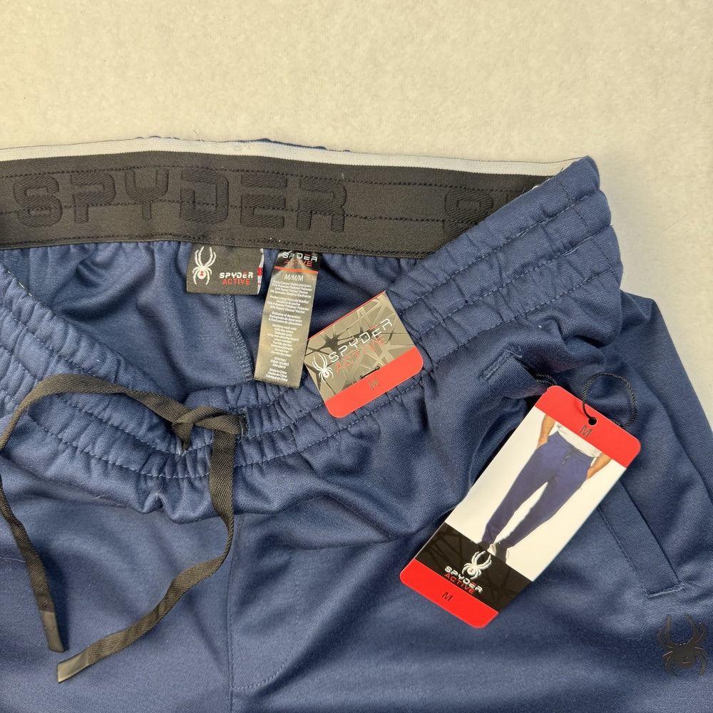 Clothing tag view on Spyder blue jogger pants, size M