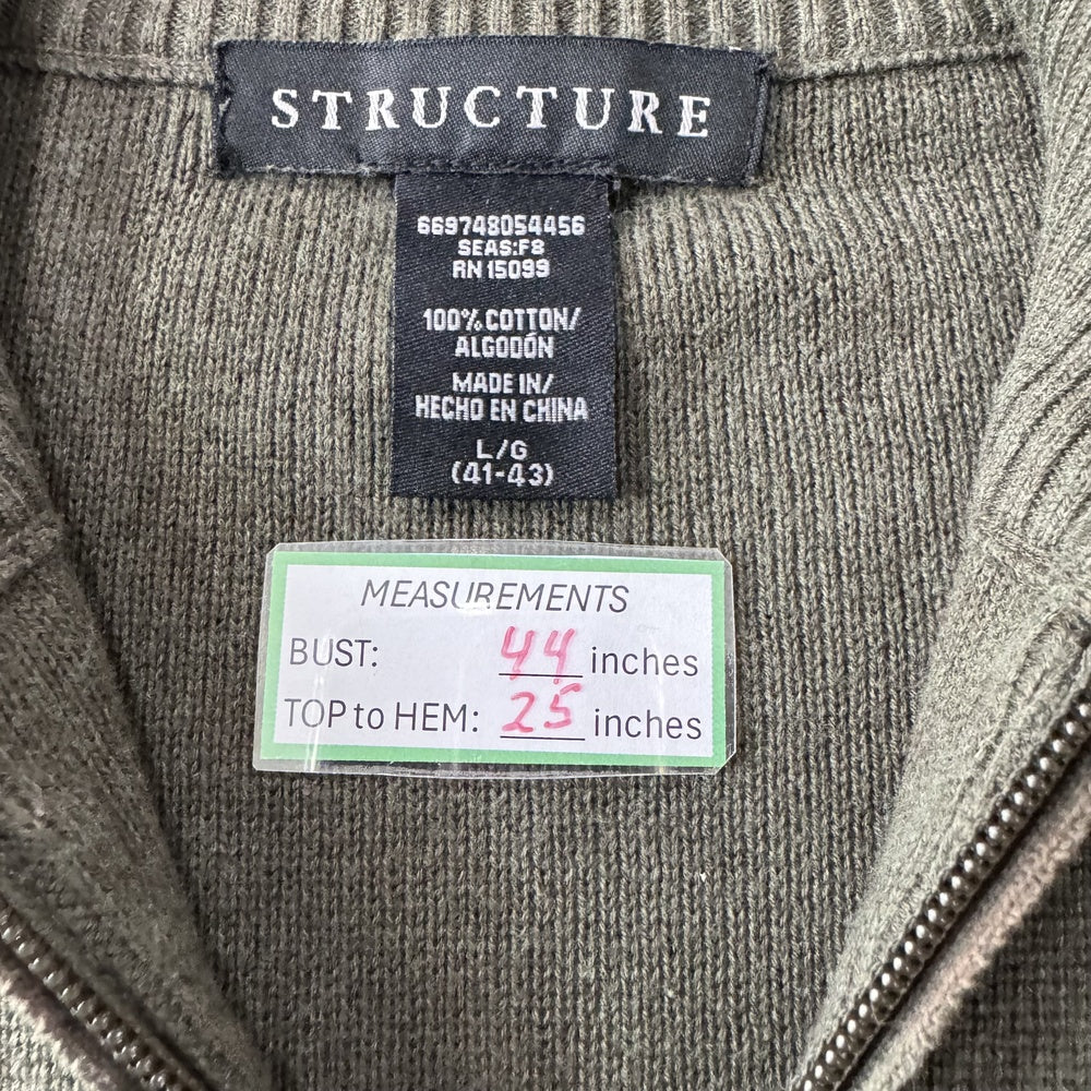 Clothing label with measurements on Structure knit green sweater size L